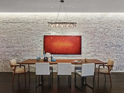 Photo 7 of 10 in Revealing the Pros and Cons of Exposed Brick and How to Take Care of It from A Renovated Loft in SoHo - Dwell Brick Wall Dining Room, Whitewash Brick Wall, Minimal Dining Room, Whitewashed Brick, Minimal Dining, Brick Wall Backdrop, Interior Brick, Dining Room Industrial, White Wash Brick