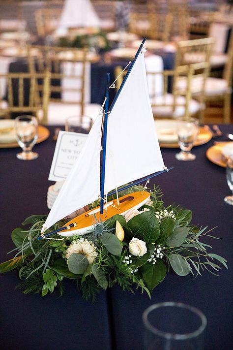 Simple Nautical Centerpieces, Sailboat Centerpiece, Nautical Centre Piece, Nautical Wedding Flowers, Nautical Flower Centerpieces, Nautical Card Box Wedding, Boat Centerpieces, Sailboat Decor, Table Floral Arrangements