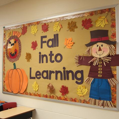 9 Fall Bulletin Board Ideas to Inspire Your Creativity Change Bulletin Board Ideas, Falling In Love With Learning Bulletin Board, Preschool Fall Classroom Decorations, Fall Builtin Boards, Leaf Bulletin Board For Preschool, Diy Halloween Bulletin Board, Primary School Bulletin Boards, Classroom Fall Decor Ideas, Teacher Bulletin Board Ideas Elementary