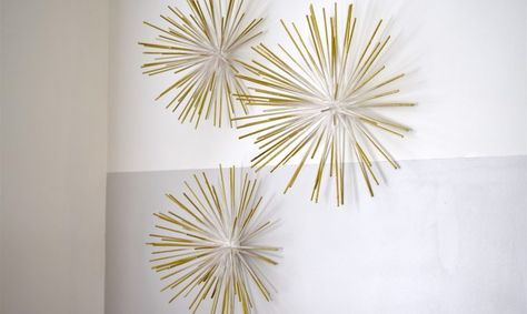 This DIY Starburst Wall Art Gives Your Room Instant Glam | Craftsy Starburst Wall Art, Starburst Wall Decor, Starburst Mirror, Gold Wall Decor, Gold Starburst, White Spray Paint, Paper Wall Art, Gold Wall Art, Kid's Bedroom