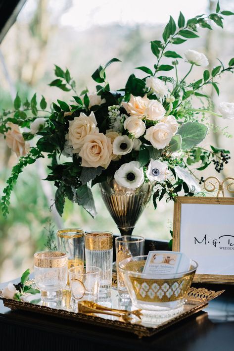 An organic, natural floral arrangement featuring anemones, roses and greenery in blush, white and cream tones makes a beautiful statement piece at this wedding reception from a winter wedding at JM cellars with a black and white theme. This wedding is filled with inspiration for a Pacific Northwest winery wedding and a Pacific Northwest winter wedding! Flowers: Botanique Photo: Jenn Tai Photo Artistry Color Palette With Gold, Black And White Centerpieces, Jm Cellars, Gold Wedding Flowers, White Floral Arrangements, White Winter Wedding, Elegant Winter Wedding, Blush Wedding Flowers, Winter Wedding Flowers