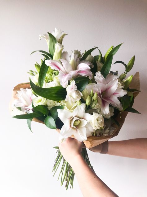 Bouquet of lilies, eustoma & white roses. #bouquetoflilies #lilies #flowers #bouquetwithpaper #eustoma #whiteroses Bouquet Of Flowers Lilies, Bouquet Of White Lilies, Bouquet Of Lilies Aesthetic, White Tiger Lily Bouquet, Asiatic Lily Bouquet, Rose Lily, Lily Flower, White Roses, Flowers Bouquet