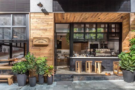 Elephant Grounds Debuts an Airy Nature-Inspired Space in the Heart of Hong Kong's Concrete Jungle Rustic Coffee Shop, Bar Exterior, Coffee Shop Interior Design, Coffee Stands, Coffee Shops Interior, Coffeehouse, Coffee Shop Design, Shop Front Design, Rustic Outdoor