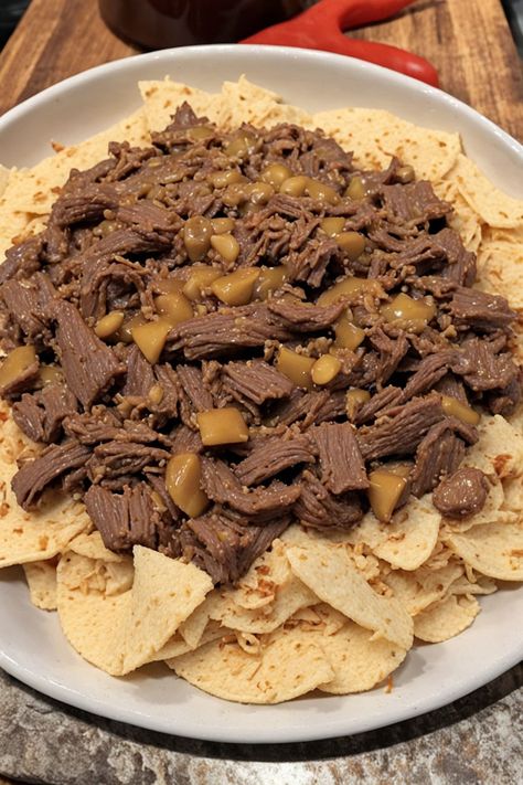 Slow Cooker Beef Machaca Recipe

Ingredients

- 2 pounds beef chuck roast
- 1 onion, diced
- 4 cloves garlic, minced
- 1 can (4 ounces) diced green chiles
- 1 tablespoon ground cumin
- 1 tablespoon chili powder
- 1 teaspoon paprika
- 1/2 teaspoon salt
- 1/2 teaspoon black pepper
- 1/2 cup beef broth
- 1/4 cup lime juice
- Corn tortillas, for serving

Full Cooking Instructions on... Beef Machaca, Machaca Beef, Machaca Recipe, Corn Dip Recipes, Green Chiles, Beef Chuck Roast, Best Slow Cooker, Shredded Beef, Beef Chuck