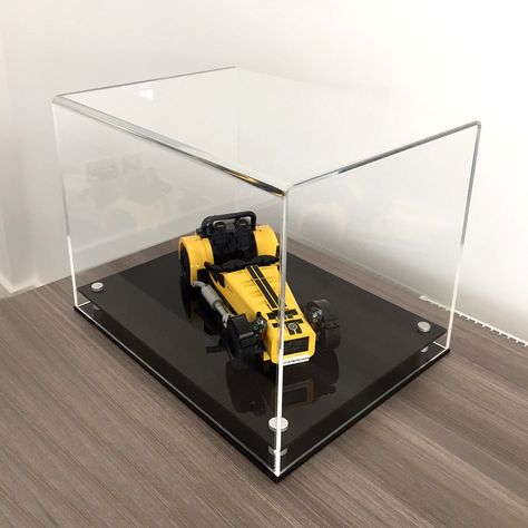 Model display cases with a modern looking black or white base to protect and hold models or collectables. The two layer base held apart with satin silver finish mounts and clear acrylic display case cover complete the modern look. Retail Display Case, Lego Display Case, Museum Display Cases, Wooden Display Cabinets, Funko Pop Display, Memorabilia Display, Trophy Display, Table Top Frame, Model Display