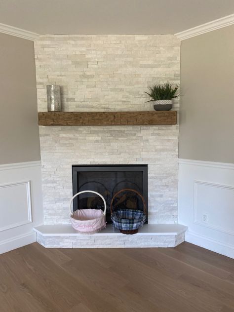 Stone Fireplace On Angled Wall, Electric Fireplace Ideas Living Room, Corner Fireplace With Mantle, Corner Fireplace Accent Wall, Small Corner Fireplace, Modern Corner Fireplace Ideas, Fireplace Stone Ideas, Bismarck House, Corner Mantle