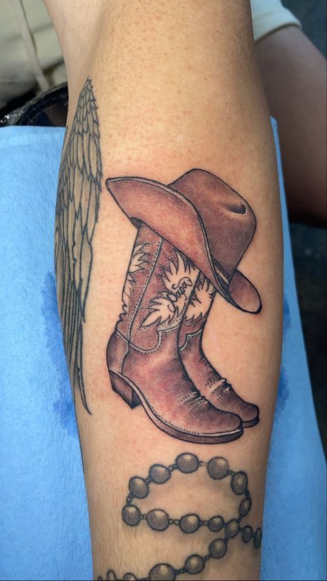 Boot Tattoos For Women, Cowboy Hat And Boots Tattoo, Cowboy Boots Tattoo For Women, Southern Tattoos For Women, Country Music Tattoos For Women, Minimalist Flower Tattoos, Tattoo Ideas Female Western, Flower Tattoos Minimalist, Western Tats