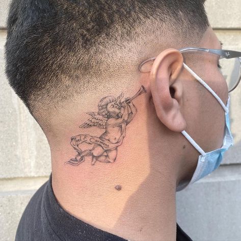 Angel With Trumpet Tattoo, Whispering Angel Tattoo, Baby Angels Tatoos, Thug Angel Tattoo, Angel Tattoo Men Neck, Angel Whispering Tattoo, Angel Shoulder Tattoo Men, Neck Angel Tattoo, Angel Behind Ear Tattoo