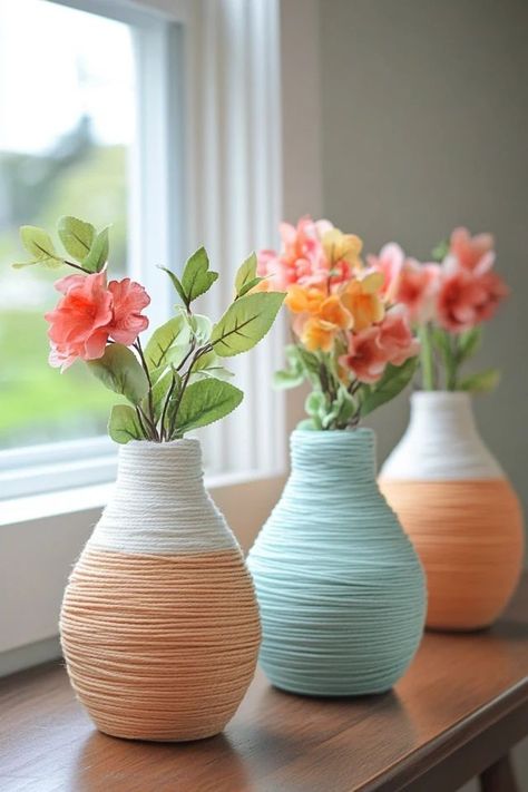 "Add rustic elegance to your decor with DIY Twine-Wrapped Vases! 🌿🧵 A simple yet stylish way to upcycle old vases or jars into beautiful home accents. 🌟✨ #TwineCrafts #DIYHomeDecor #VaseDesign" Upcycled Flower Vase, Crafts With Twine, Repurpose Vases, Diy Detergent, Twine Diy, Twine Crafts, Detergent Bottles, Old Vases, Striped Vase