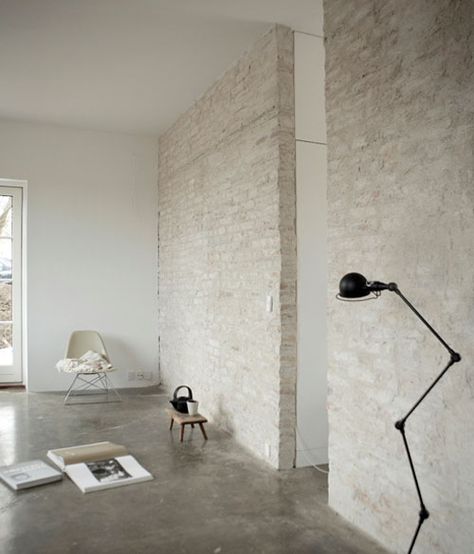 The home of Kasper Ronn from NORM Copenhagen - NordicDesign Brick Interior, Studio Loft, White Wash Brick, Beton Design, Bright Apartment, Norm Architects, Concrete Floor, White Brick, Artist House