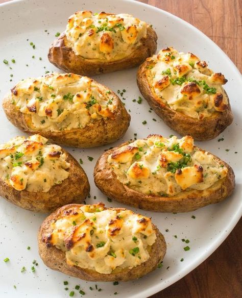 Cook's Country on Instagram: "Our Super-Stuffed Baked Potatoes are full of fluffy potato, garlic, herbs, and creamy cheese packed into a perfectly crisped potato-skin shell. Tap the link in bio to get the recipe." Stuffed Baked Potato, Baked Potato With Cheese, Easy Bacon Recipes, Baked Potato Recipe, Kale Caesar, Stuffed Baked Potatoes, Potato Skin, Baked Potato Recipes, America's Test Kitchen Recipes