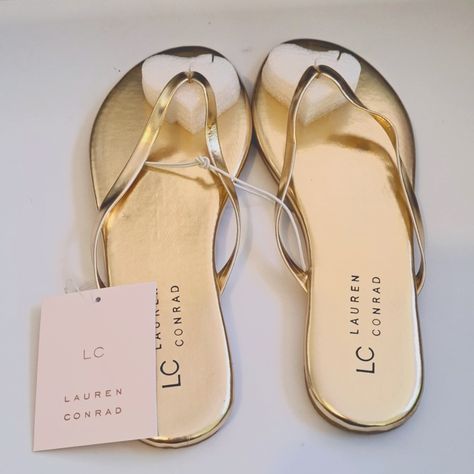 Add A Comfortable And Chic Fit While Wearing These Lc Lauren Conrad Honey Thong Flip Flops. Lovely Summer Wear And Great For The Beach Too! Gold* Size 5 *Lc Lauren Conrad Has Discontinued This Color! Comfortable Foam Footbed Flexible Traction Sole Polyurethane Upper Manmade, Polyurethane Lining Foam Midsole Manmade Outsole Open Toe 12/2687-2688/K450 White Sandals Flat, Pink Block Heels, Cutout Boots, Black And White Sandals, Blue Leather Sandals, Rose Gold Sandals, Sandals Gold, Bootie Sandals, Womens Sandals Wedges