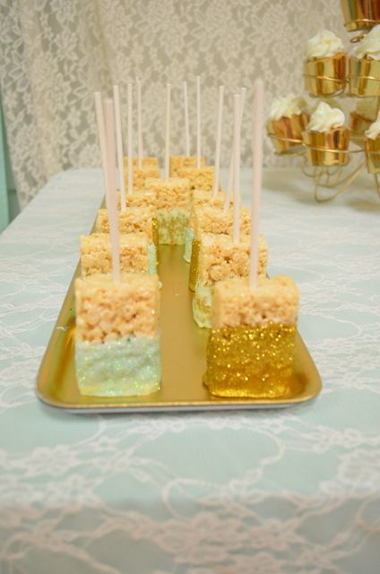 Sparkly Rice Krispie treats at a vintage, gold and mint Baby Shower!  See more party ideas at CatchMyParty.com! Gold Rice Krispie Treats, Gold Party Food, Gold Frosting, Baby Shower Dessert Ideas, Shower Dessert Ideas, Work Baby Showers, Mint Palette, Mint Party, Mint Baby Shower