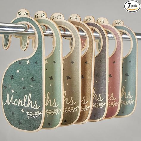 [Premium Nursery Decor]: Enhance the beauty of your baby's wardrobe with these wooden closet dividers which will complement any nursery theme [Wonderful Hanger Dividers]: These dividers fit perfectly on standard sized hangers, making it easy to separate clothes by age, size or seasons Hanger Dividers, Wooden Closet, Baby Hangers, Closet Dividers, Nursery Closet, Nursery Theme, Baby Closet, Hanging Organizer, Closet Size