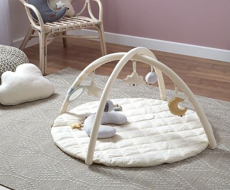 The luxurious organic cotton lining of this soft floor gym plays an important role in protecting your babies in the process of learning to stand and play. Parents can also enjoy a comfortable and safe playtime with their children with this activity gym Baby Gym Mat, Tummy Time Pillow, Wooden Play Gym, Baby Activity Gym, Wooden Baby Gym, Tummy Time Mat, Baby Play Gym, Baby Sensory Toys, Baby Activity