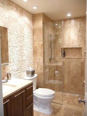 This tranquil space combines travertine in multiple tile sizes and textures to create interest. Natural Stone Tile Bathroom, Travertine Shower, Stone Tile Bathroom, Affordable Bathroom Remodel, Travertine Bathroom, Natural Stone Bathroom, Natural Bathroom, Shower Floor Tile, Cheap Bathrooms