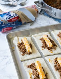 These super simple Cheesy Taco Sticks are buttery breadsticks filled with taco meat and lots of cheese! Perfect for snacking or watching the big game! Cheesy Taco Sticks, Taco Sticks, Mexikansk Mat, Resep Pizza, Fingerfood Party, Taco Meat, Läcker Mat, God Mat, Toddler Snacks