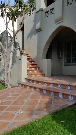 Saltillo tile pavers look great with Spanish-style homes Spanish Exterior, Rustic Staircase, Saltillo Tile, Spanish Garden, Tile Stairs, Exterior Stairs, Patio Tiles, Garden Design Layout, Spanish Style Home