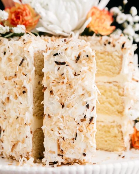 Almond Coconut Layer Cake Coconut Almond Cake, Creamy Cucumber Tomato Salad, Almond Coconut Cake, Coconut Layer Cake, Coconut Buttercream, Coconut Extract, Creamy Cucumbers, Spring Cake, Almond Extract