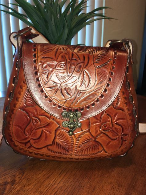 Mexican leather handbag from Olvera Street in downtown Los Angeles #olverastreet #mexican #mexicanstyle #mexicanhandbag #mexicanpurse #mexicanleatherhandbag #mexicanleatherpurse #leatherhandbag #brownleather #brownleatherhandbag #purse #leatherpurse #flowerhandbag #brownbag #brownpurse #embossed #embossedhandbag Leather Mexican Purse, Mexican Leather Bags, Mexican Bags Handbags, Western Purses And Handbags, Mexican Bags, Mexican Purse, Olvera Street, Tooled Leather Handbags, Mexican Bag