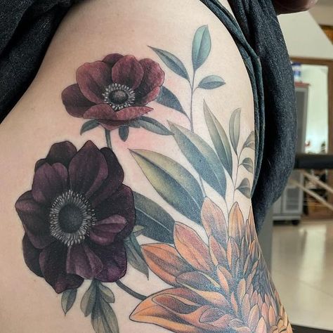 Black And Purple Flower Tattoo, Flower Thigh Garter Tattoo, Color Over Black Tattoo Cover Up, Dark Colored Tattoos, Dark Purple Flower Tattoo, Dark Color Flower Tattoo, Moody Floral Tattoo, Big Flower Tattoo Designs, Color Shading Tattoo