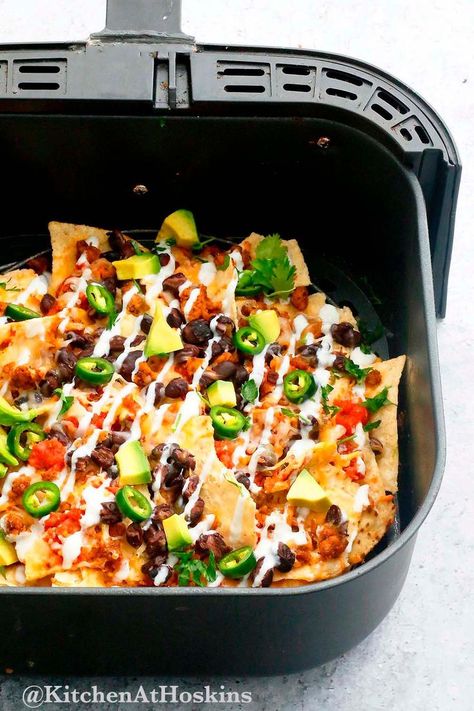 Mouth watering Air Fryer Nachos recipe is incredibly simple to make with less than 5 minutes of cooking time | air fryer nachos | air fryer nachos recipe | chicken nachos recipe air fryer Air Fryer Chicken Nachos Recipe, Air Fryer Nachos Recipes, Air Fryer Vegetarian Recipes, Air Fryer Nachos, Vegetarian Nachos, Cheesy Snack, Air Fryer Recipes Vegetarian, Authentic Mexican Recipes, Spiced Cauliflower