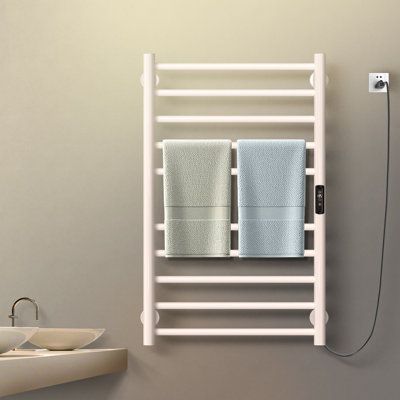 Adding a heated towel bar is one that can turn your everyday shower into a luxurious experience. Our 10-Bar Towel Warmer is your best option, on account of its reasonable price tag, modern design, and undeniably sleek appearance. Once installed, you can just plug into an outlet and enjoy toasty textiles in as little as 3-5 minutes. In addition to heating your bath sheets, our Warmer prevents fabrics from developing that dreaded musty smell and ultimately reduces how often you have to wash your b Heated Towel Bar, Heated Towel Warmer, Electric Towel Warmer, Heated Towel Rack, Towel Warmer, Towel Storage, Heated Towel, Bath Sheets, Bath Linens