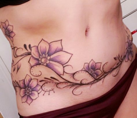 Flowers cover up tummy tuck scar Lower Body Lift Scar Tattoo, Extended Tummy Tucks Tattoo Cover Up, Possibility Tattoo, C Section Tattoo Cover Up, Tummy Tattoos For Women Lower Stomach, Tummy Tucks Tattoo Cover Up, Abdominal Tattoos Women, Savannah Tattoo, Tattoo Scar Cover