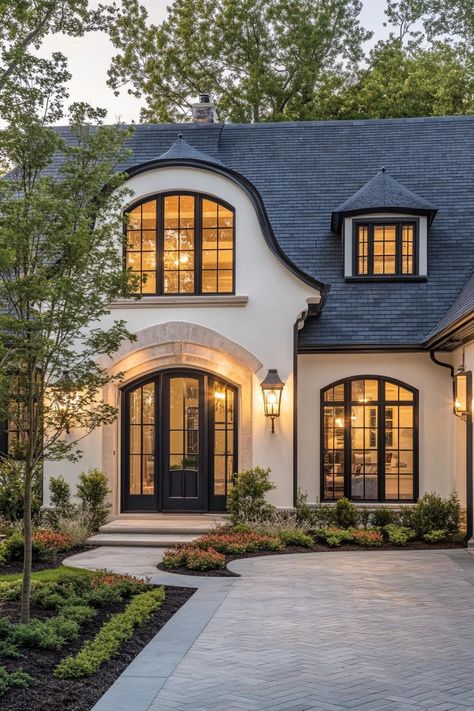 60 Stylish Transitional Homes for a Perfect Balance of Old and New Historic Modern Home, Modern French Style Homes Exterior, Curved Roof House, Front House Windows Ideas, Round Windows Ideas, French Style Home Exterior, French Modern Home Exterior, Modern French Style Home, Transitional House Exterior