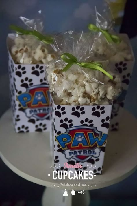 Paw Patrol Birthday Party | CatchMyParty.com Paw Patrol Party Ideas Centerpieces, Paw Patrol Birthday Decoration Ideas, Paw Patrol Birthday Centerpieces, Paw Patrol Party Treats, Paw Patrol Gift Ideas, Paw Patrol Candy Table, Paw Patrol Centerpiece Ideas, Paw Patrol Centerpiece, Paw Patrol Birthday Party Ideas