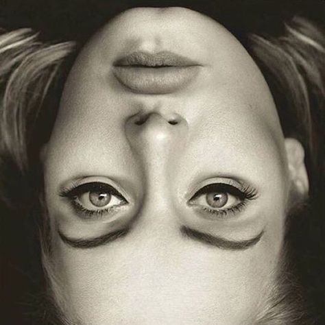 adele. While the singer's face has been turned upside down, her eyes and mouth have actually been left the right way up. The result is something that looks borderline nightmarish — and people have been going nuts over it. Adele Eyes, Upside Down Pictures, Face Illusions, Illusion Tricks, Adele Pictures, Funny Optical Illusions, Adele Photos, Funny Illusions, Cool Illusions