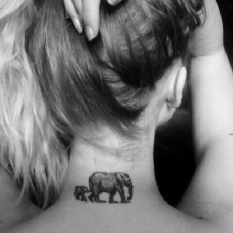 Elephant tattoos are on the rise among tattoo lovers of all ages and backgrounds. The elephant is known to represent many things among different cultures. Because of its size and strength, it represents being strong, and being tough, like its exterior skin. Patience is also a virtue symbolic of this great animal, as is honor. One of the most common reasons that people get an elephant tattoo is because elephants mean good luck and good fortune, and everyone wants some of that! Baby Elephant Tattoo, Tattoo Elephant, Tattoo Son, Elephant Tattoo Design, Mom Tattoo, Tattoo Magazine, 4 Tattoo, Elephant Tattoo, Photo Grid