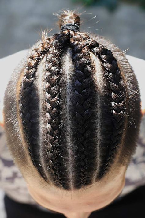 Four Cornrow Braids #undercut #manbraid #manbun #braidsformen #cornrows Want to try on man bun braids and looking for some inspiration? In our gallery, you'll find the most elaborate design ideas that suit everyone, from white to black men. Choose the style that matches your tastes and preferences, be it a short hair braided top knot or undercut cornrow bun. #menshaircuts #menshairstyles Trendy Cornrows, Man Bun Braids, Undercut Braids, Mens Ponytail Hairstyles, Long Undercut, Cornrows Men, Bun Braids, Braids With Fade, Braided Man Bun