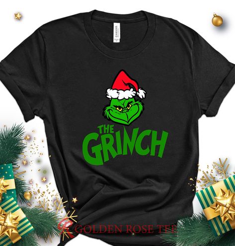 "Grinch Christmas Shirt, Grinch Face Shirt, Xmas Tshirt, Christmas Tee, Christmas Gifts, Christmas Family Shirt, Xmas Family Shirt When ordering in the baby category, please specify which ones you choose 3-6, 6-12, 12-18 or 18-24 Month. ---How To Order --- 1-) Please, check and review all photos 2-) Choose your t-shirt size and color *Different styles of shirts may have different shades of same color choice due to different manufacturer brands. *For this reason, we recommend you to match shirts Family Christmas Sweaters, Grinch Shirts, Green Characters, Xmas Tees, Xmas Lights, Merry Christmas Shirts, Funny Xmas, Funny Christmas Shirts, Family Christmas Shirts