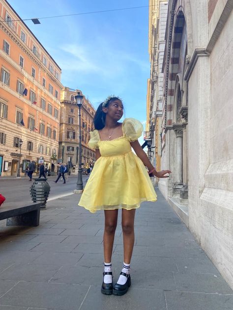 Yellow puff dress with mary jane shoes and white socks with stripes and a flower crown worn in Italy Dress With Mary Jane Shoes, Puff Dress Outfit, Yellow Puff Dress, Puff Dress, White Socks, Jane Shoes, Dress Outfit, Mary Jane Shoes, Flower Crown