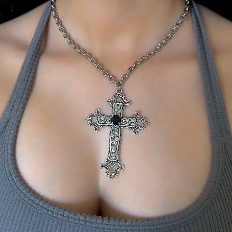 This Gothic Cross Necklace includes a Silver Big Cross Pendant making it a perfect vintage grunge jewelry gift for her. Featuring a statement black rhinestone on the center of the cross pendant, it blends religious jewelry elements with bold, edgy style. 𝐃𝐄𝐓𝐀𝐈𝐋𝐒:  ⭐️ Necklace lengths available: 14" 16" 18"  ⭐️ Big cross pendant size is 3" ⭐️ The large silver cross pendant is silver plated over metal. The chain necklace is made up of a high quality stainless steel, safe for those with sens Cross Necklace Chunky, Chunky Cross Necklace Outfit, Cross Necklace Aesthetic, Big Cross Necklace, Big Silver Necklace, Gothic Cross Necklace, Cross Accessories, Big Cross, Y2k Necklace