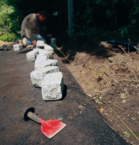 A Better Driveway Border - This Old House Belgian Block Driveway, Gravel Driveway Edging, Driveway Apron, Driveway Border, Belgian Block, Driveway Edging, Bag Of Cement, Stone Driveway, Gravel Driveway