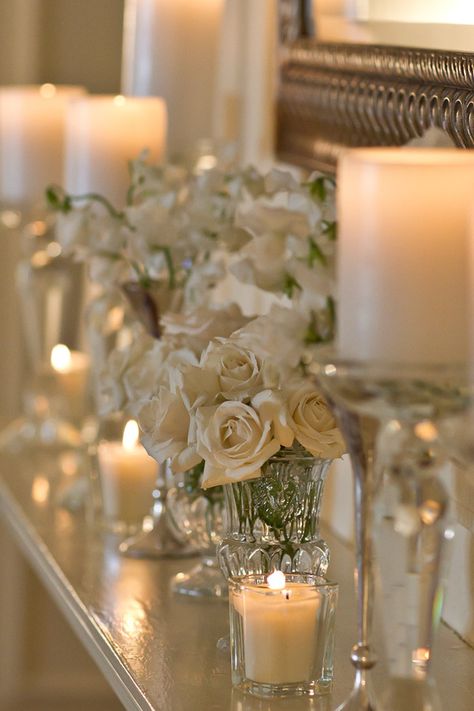 Beautiful cut glass vases with roses, tons of candle glow- so romantic! Flowers And Candles, Vibeke Design, Mantle Piece, Manor Wedding, Deco Floral, Cool Ideas, White Candles, Candle Lanterns, White Christmas