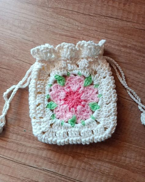 Sakura Granny Square Pouch . . . #crochetersofinstagram #sakura #crochetsakura #crochetsakuraflower #crochetkawaii #drawstringbag #crochetairpodscase #airpodpouch #crochetpouch #crochetapplique #grannysquare #grannysquaresrock #stopmotionanimation #sakuragrannysquare #india #indiasmallbusiness #indiacraftingmemories #indiahandicrafts #handmadeindia #handmadewithlove #handmadegifts #pinterestinspired #rainbowdustcrochetry #smallbuisnesscommunity #smallbusinessindia #indiacrochetclub #punesm... Sakura Granny Square, Granny Square Pouch, Granny Squares Crochet, Pouch Crochet, Squares Crochet, Crochet Pouch, Christmas Calendar, Sakura Flower, Crochet Applique