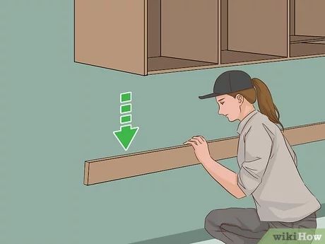 Hanging A Cabinet, Hanging Garage Cabinets, Hanging Upper Cabinets, How To Install Wall Cabinets, How To Hang A Cabinet On A Wall, How To Mount Cabinets On Wall, How To Hang Wall Cabinets, Hanging Cabinets Kitchen, How To Hang Kitchen Cabinets