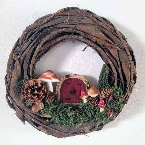 Fairy Door Wreath Gnome Home Woodland Decor Cottage Core Pine Cone Mushroom Autumn Neutral Cute Home Gifts for Fall This adorable wreath would look great for your front door for autumn. It measures 30cm 12 inches in diameter. It is accented with an adorable door, pinecones, and mushrooms.  I hang mine simply with a nail on the wall. I can add some twine if you would want for hanging. I also can create a custom wreath just contact me. Mushroom Autumn, Fairy Wreath, Enchanted Woodland, Gnome Wreath, Gnome Home, Random Products, Moon Crafts, Boho Crafts Diy, Diy Porch