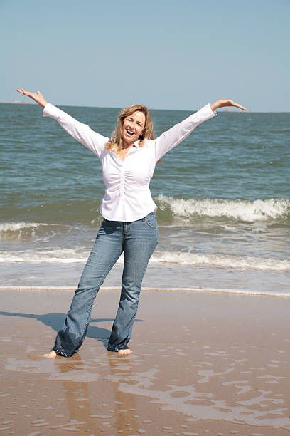 Woman with her hands in the air Hands In Air Pose, Hands In The Air Pose, Hands In The Air, Wet Clothes, Reference Images, Quick Saves, Clothes