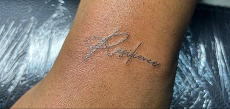 Resilience Word Tattoo, No Worries Tattoo, Resilient Tattoos For Women, Resilient Tattoo, Resilience Tattoo, Birthday Shots, Stylist Tattoos, Elegant Tattoos, Word Tattoos