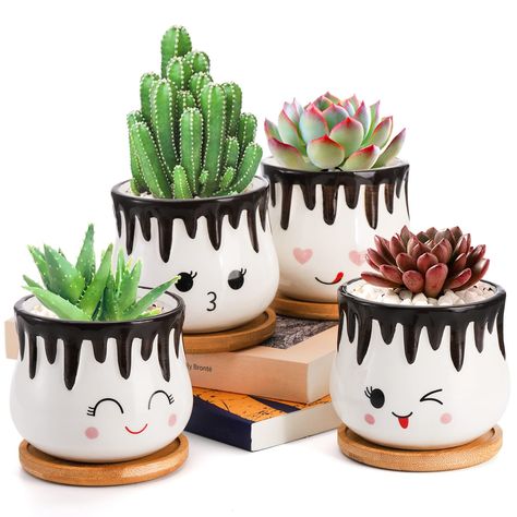 PRICES MAY VARY. Package Includes - A set of 4 different cute pattern planter, 4 x bottom trays. Note: Plants are not included in this item. Quality - Durable ceramic is well made, high temperature ceramic to make sure the most stable, strongest and good quality, the high temp ceramic has high density to avoid water infiltrate to succulent planter pots to cause color change. Unique Pattern Design -This set of cute pots is printed with different facial expression and cute hot chocolate. Add some Pretty Flower Pots, Cute Painted Plant Pots, Pottery Painting Designs Plant Pots, Cute Planters Pots, Cute Plant Pot Designs, Hand Painted Plant Pots Cute Ideas, Flower Pot Painting Ideas Creative, Pots Painting Ideas, Cute Hot Chocolate