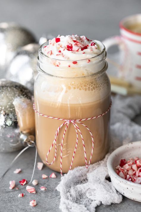 This DIY version of a peppermint white chocolate mocha is simple to make, sweet, and incredibly cozy. With creamy white chocolate and cool, frosty peppermint, this warm coffee beverage is the ultimate winter treat! #peppermintmocha #whitechocolatemocha #peppermintwhitechocolatemocha #whitechocolatepeppermintmocha #holidaybeverages #coffeedrinks Peppermint Coffee Syrup, Peppermint White Chocolate Mocha, White Chocolate Peppermint Mocha, Holiday Coffee Drinks, Peppermint Bark Cheesecake, Spice Bundt Cake, Peppermint Mocha Recipe, Peppermint White Chocolate, White Chocolate Syrup