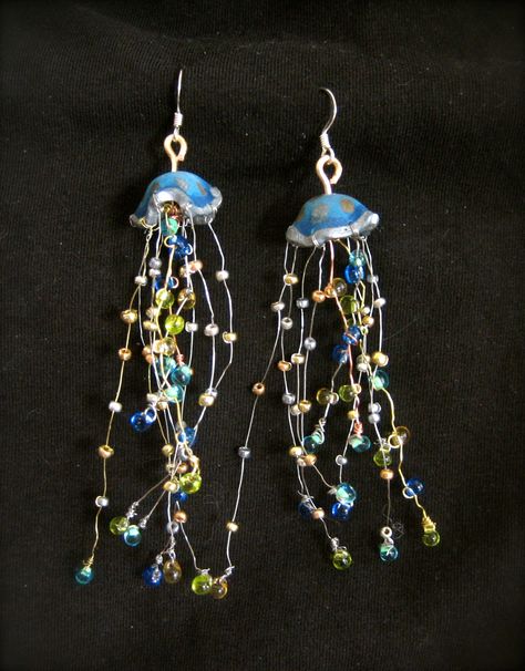 Here is one of my favorite new creations: jellyfish earrings! I've been getting really into shrink plastic and thought of using it to make a jellyfish body and used beads and wire for its tentacles. Aglets Diy, Selfmade Earrings, Accessories Idea, Jellyfish Earrings, Fun Craft Ideas, Bracelets Easy, Estilo Hippy, Wire Jewellery, Beaded Jewellery