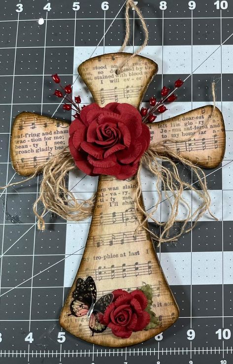 Crafts Using Old Hymnal Pages, Christian Crafts To Sell Easy Diy, Crafts With Hymnal Pages, Christian Crafts For Adults, Decorated Crosses, Hymnal Crafts, Music Centerpieces, Cross Ornaments, Wooden Cross Crafts