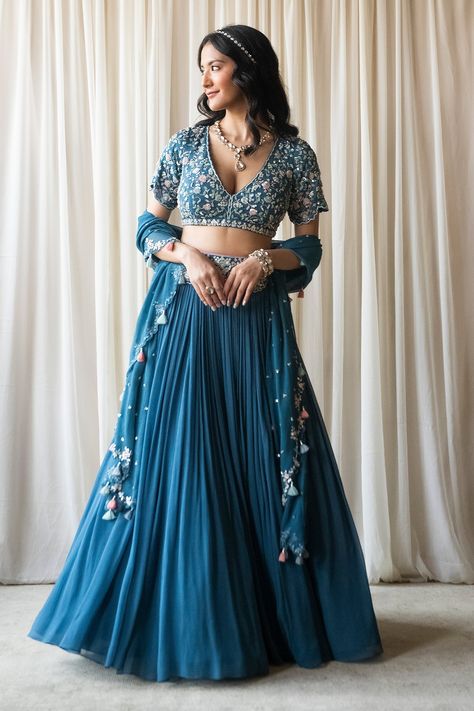 Blue lehenga with attached cancan and embroidered waistband. Paired with sequin, bead hand embroidered padded blouse and dupatta. Components: 3 Pattern: Embroidery Type Of Work: Sequin, bead, floral Neckline: V neck Sleeve Type: Half Fabric: Georgette Color: Blue Other Details:  Scallop bordered sleeve hem Tassel bordered sheer dupatta Occasion: Wedding - Aza Fashions Lehenga Haldi, Belt Lehenga, Summer By Priyanka Gupta, Reception Sarees, Simple Lehenga, Lehenga Saree Design, Function Dresses, Raw Silk Lehenga, Blue Lehenga