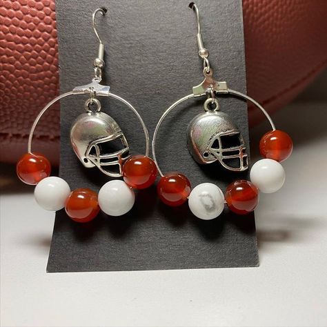 Football Earrings by Love2Jewelry on Etsy Football Jewelry, Pomegranate Earrings, Sun And Moon Necklace, Football Earrings, Vendor Events, Fan Earrings, Homemade Jewelry, Red Earrings, Beaded Hoop Earrings