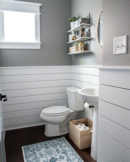 Everything You Need to Know About Shiplap | Perfect for that modern rustic look in your home. Shiplap is used as an accent in this small space. It adds visual texture to this gray and white bathroom without overwhelming the space.    #shiplap #bathroom #marthastewart #decoratingideas Beautiful Powder Rooms, Makeover Kamar Mandi, Modern Powder Rooms, Modern Powder Room, Diy Wainscoting, Kitchen Ornaments, Modern Toilet, Decor Baie, Half Bathroom